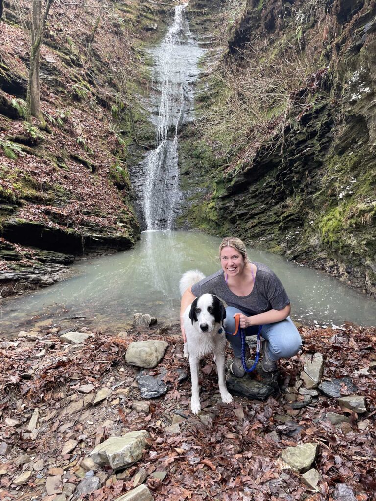 Susan with her dog at the Ouachita National Forest.