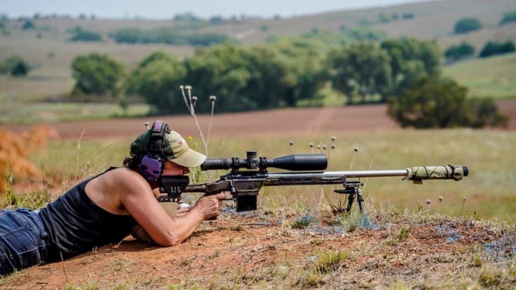 Stacey Hesser lines up a shot with her sharp shooter gun. 