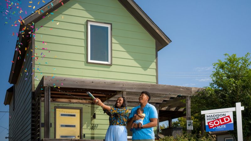 A young family of three celebrates closing on a home in Oklahoma. U.S. News & World Report’s Best Places to Live lists 5 Oklahoma cities for the 2025-26 list.